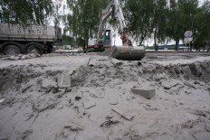 Aufräumarbeiten nach dem Hochwasser in Aschach an der Donau © APA